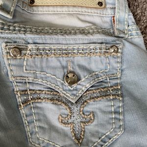 Light wash rock revival ankle skinny jeans